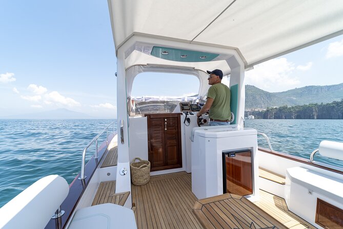 Sunset Private Boat Tour Experience in Positano - Exploring Positanos Coastline