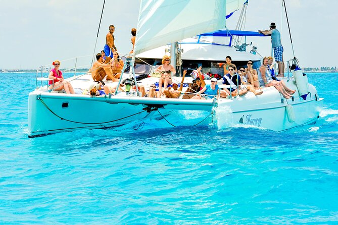 Catamaran to Isla Mujeres Snorkeling Tour With Open Bar and Lunch - Snorkeling and Isla Mujeres Exploration