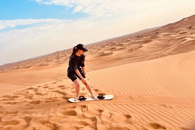 Dubai: Red Dunes Desert Safari Premium BBQ Dinner Camel Sandboard - What to Expect on the Safari