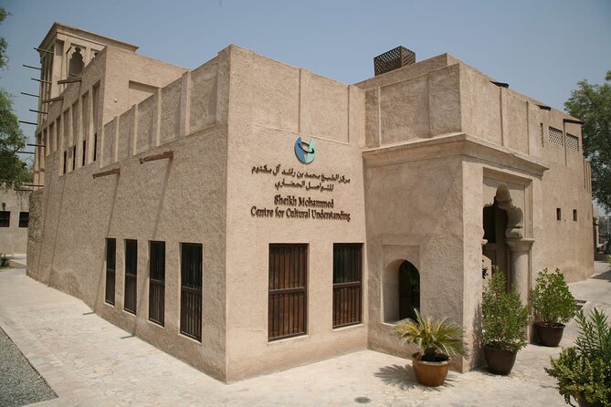 Dubais Old Town Tour and Have Lunch With Locals - Tour Highlights and Booking Details