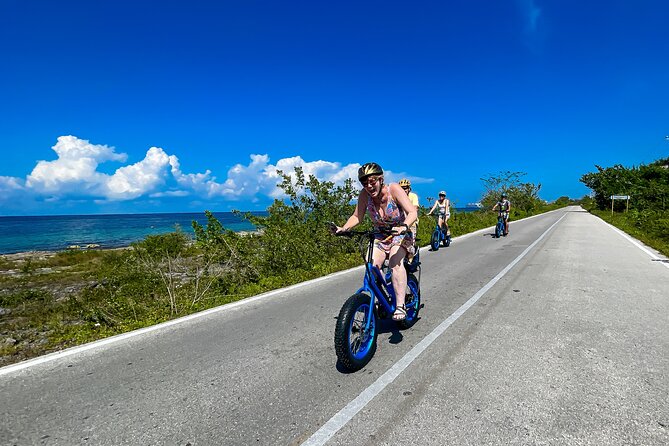 E-bike West Coast Snorkeling Tour - Guide Highlights