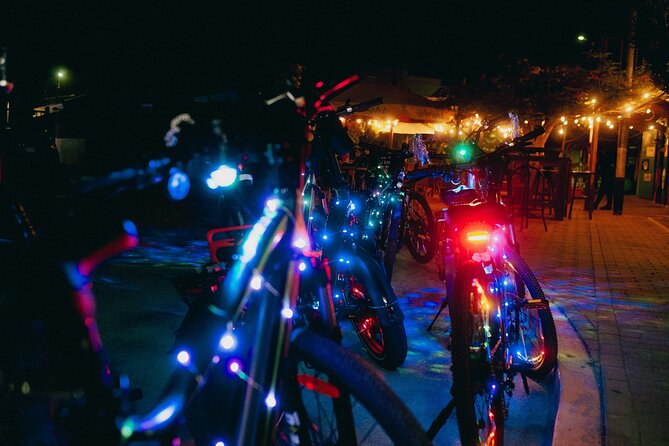 Holiday Lights Sunset Twilight Neon Glow Electric Bike Downtown - Booking and Cancellation Policy