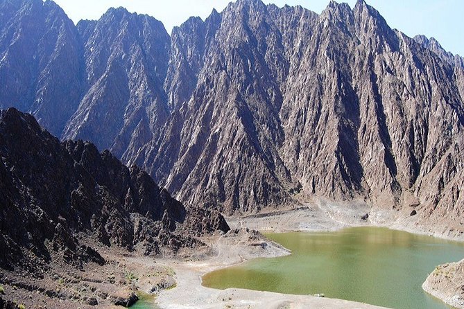Private Guided Dune Bashing Day Tour in Wadi Hatta Mountains - Experience Highlights
