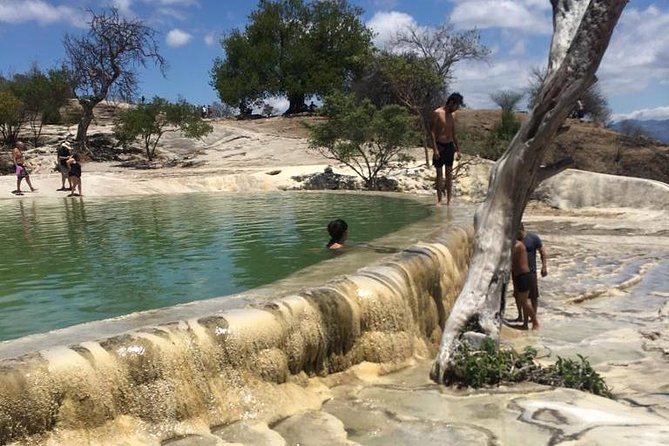 Private Tour to Hierve El Agua, Mezcal Tasting, and Textiles - Tasting Artisanal Mezcal