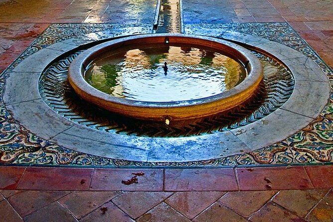 Santa Cruz Quarter and Alcazar Guided Day Tour in Seville - Tour Reference Code
