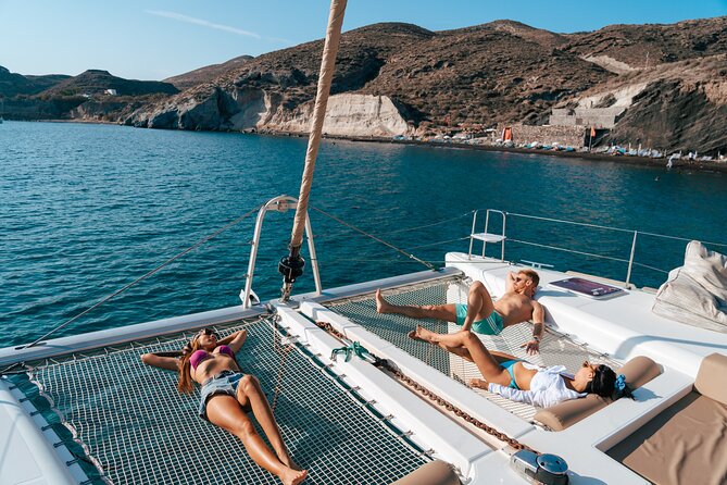 Santorini Sunset Sailing Cruise: Dinner, BBQ, Open Bar, Transfers - Booking and Flexibility