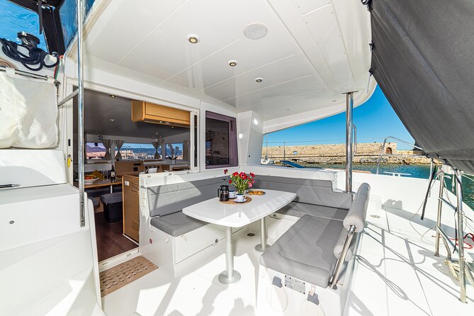 Small Group Santorini Catamaran Cruise With BBQ - Santorinis History and Sights