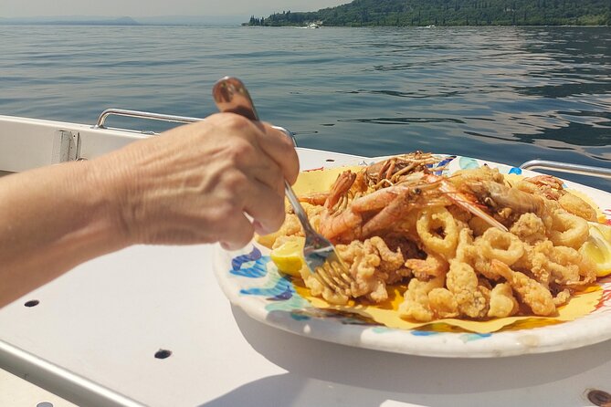 Sunset Boat Cruise With Wine and Fish Tasting From Garda - Wine and Fish Tasting