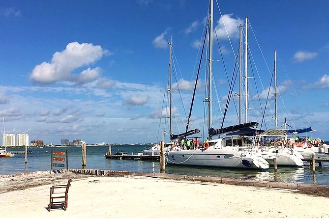 Catamaran to Isla Mujeres, Open Bar, Buffet, Beach Club Included - Frequently Asked Questions