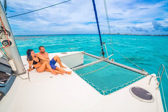 Catamaran to Isla Mujeres Snorkeling Tour With Open Bar and Lunch - Booking and Cancellation Policy