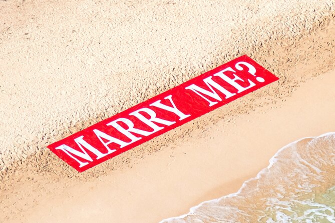 Marry Me Banner on the Beach - Helicopter Proposal Flight - Questions About Your Stay