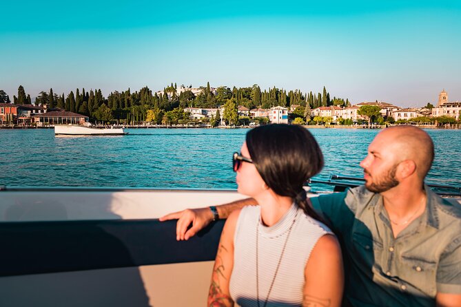 Sunset Boat Tour of Sirmione With Exclusive Onboard Aperitif - The Sum Up