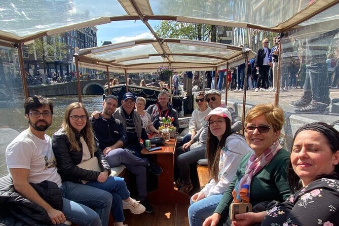 Dutch Cheese and Drinks Guided Amsterdam Canal Cruise With Locals - Key Points