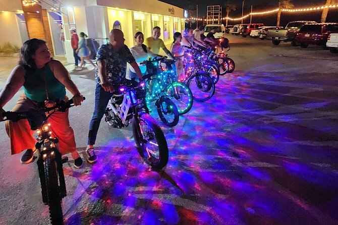 Holiday Lights Sunset Twilight Neon Glow Electric Bike Downtown - Key Points