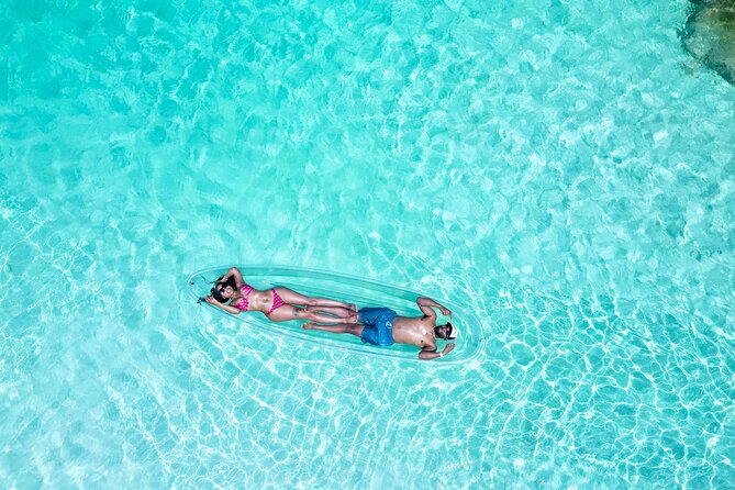Island Love Stories: Turks & Caicos Clear Kayak Couple Portraits - Romantic Escape in Turks & Caicos