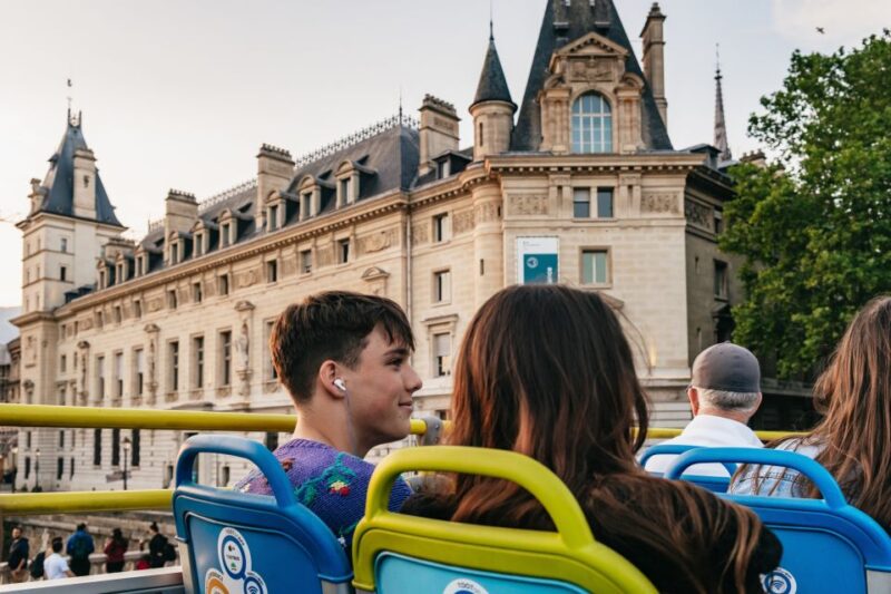 Paris: Night Bus Tour With Audioguide - Key Points