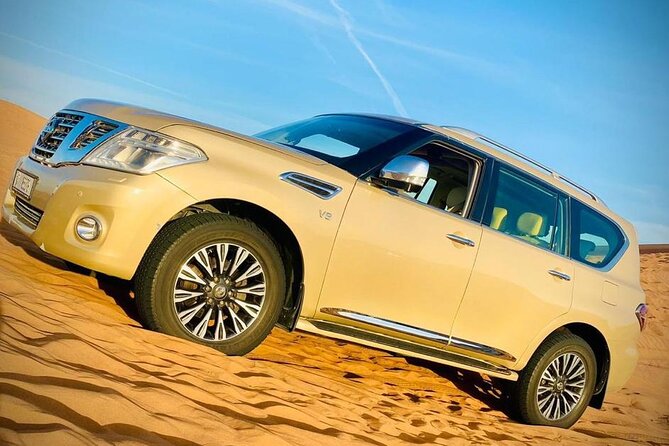 VIP Desert Safari With Dune Bashing Sandboarding Quad Bike and BBQ Dinner - Key Points