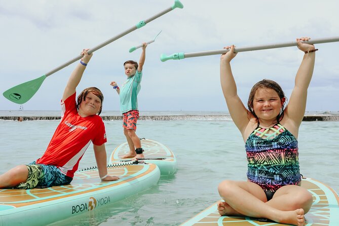 Kids Half Day Paddle Board Yoga Adventure Camp in Waikiki