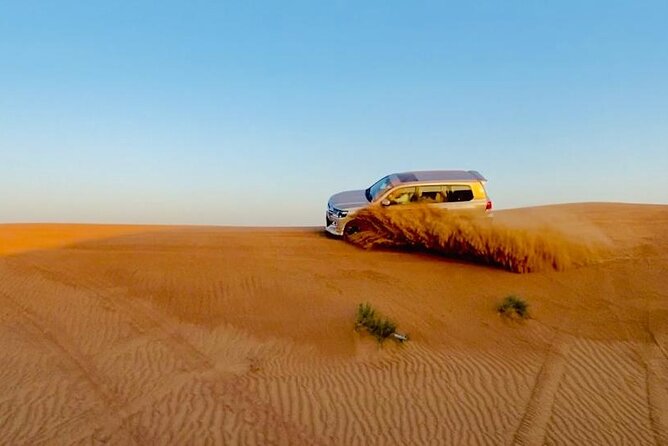 Quad Bike Tour ,Bbq Dinner, Camel Ride, Sand Surf, Belly Dance and Much More