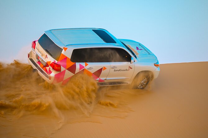 Abu Dhabi Evening Desert Safari - Dune Bashing Camel Ride and BBQ - Highlights of the Adventure