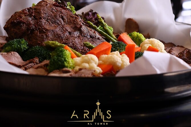 Dining at ARAS Revolving Restaurant KL Tower With Return Transfer - Dining Experience Highlights