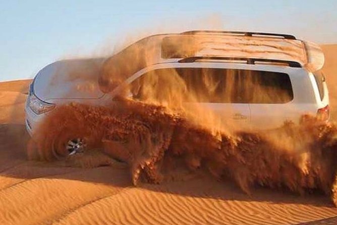 Dubai Desert Safari With Camel Riding, Sand Boarding,Bbq Dinner and 3 Live Shows - Exciting Activities Included