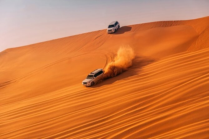 Dubai Morning Desert Safari With Dune Bashing - Private - Sandboarding on the Desert Dunes