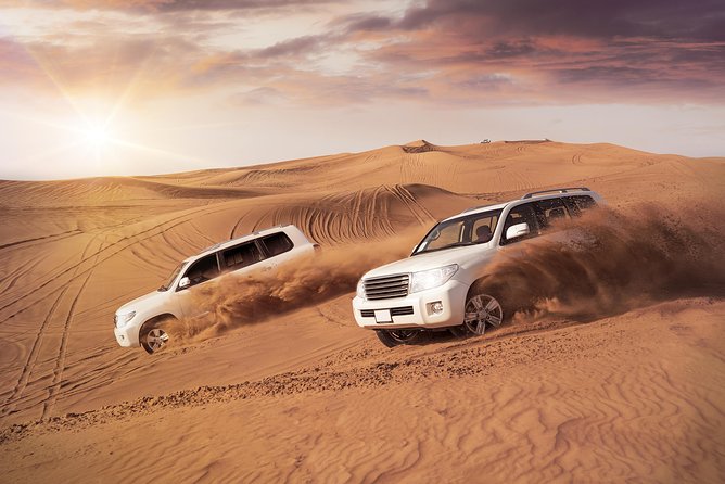 Evening Red Dunes Desert Safari Dubai With Sanboarding Camel Ride & BBQ - Transportation and Pickup Information
