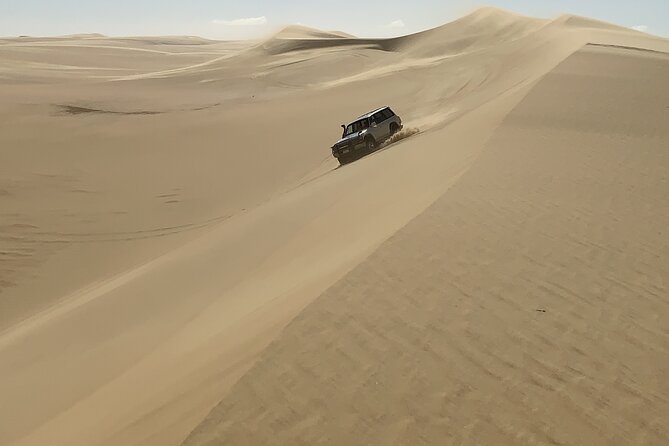 From Siwa: Sunset Desert Safari, Sand-board, Hot Spring & Dinner at Desert Camp - Adventure Activities Included