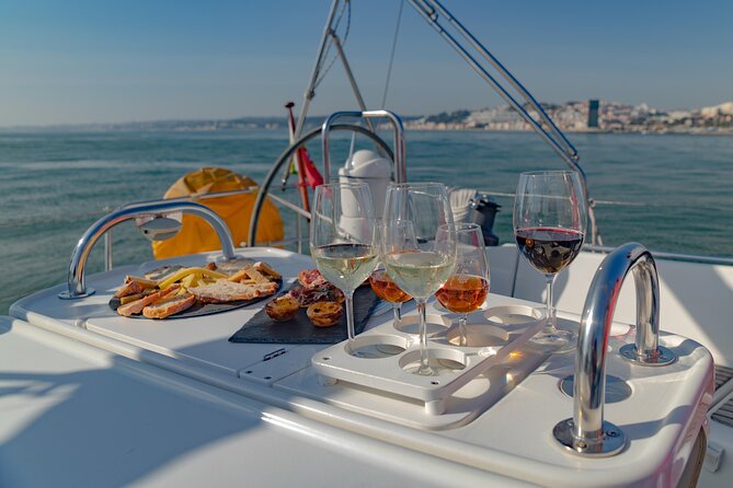 Lisbon: Wine Tasting With Sommelier on a Private Sailboat - Savoring Portuguese Delicacies and Wines