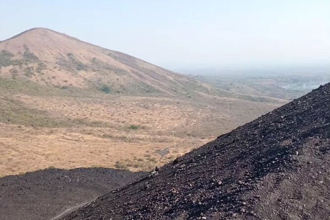 Private Sandboarding Tour Cerro Negro and the Central Park of León - Sandboarding Down the Dunes