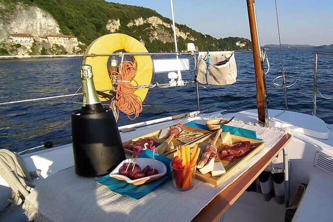 Private Tour on a Sailing Boat on Lake Maggiore With Aperitif and Music - Menu Highlights