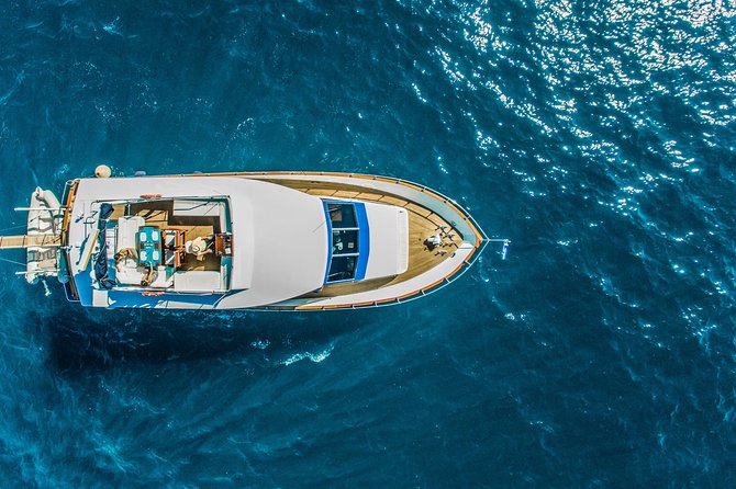 Santorini: Motor Yacht Private Cruise With 5-Course Meal - Experience Details