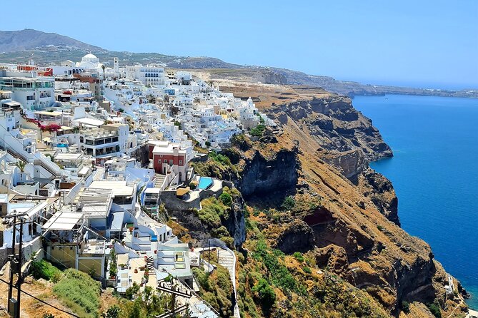 Santorini: Private Tour in the Picturesque Village of Oia - Visiting the Blue Dome Church
