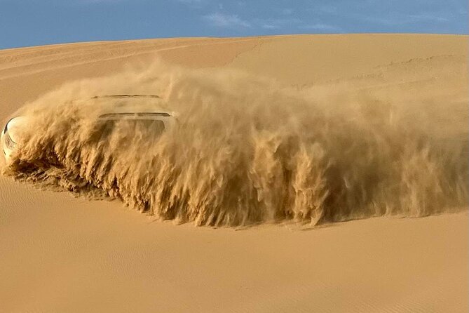 Abu Dhabi: 4x4 Desert Safari With Camel Raid & Quad Bike Option - Pickup and Group Information