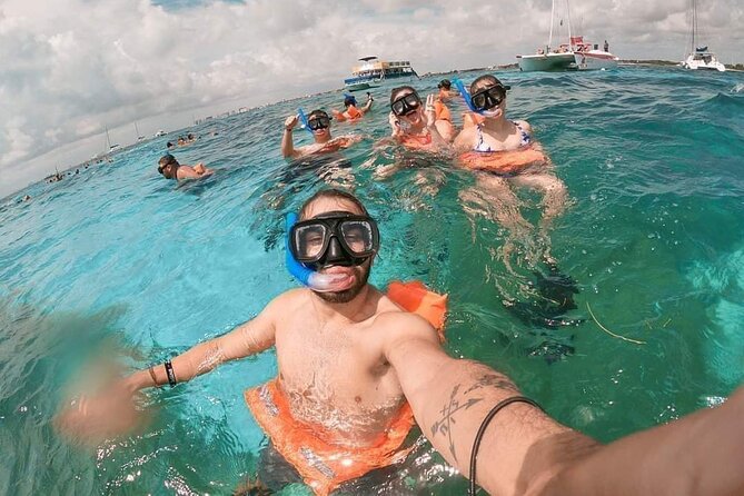 Deluxe Catamaran to Isla Mujeres, With Drinks, Snorkel & Buffet - Meeting Point Options