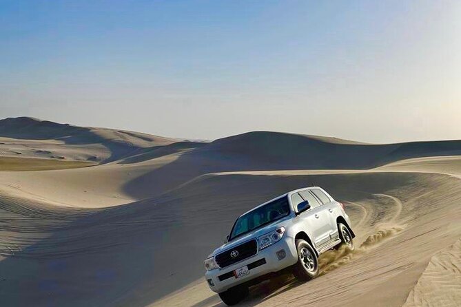 Doha Layover Desert Safari, Camel Ride, Sand Boarding, Inland Sea - Booking and Cancellation Policy