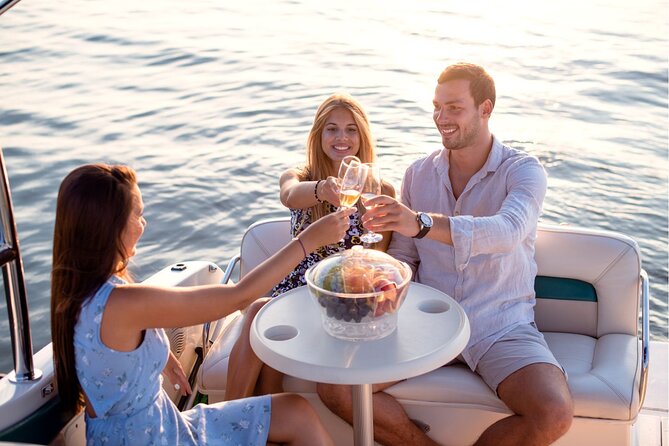 Experience Amsterdam Nightlife on Canal Cruise With Cheese & Wine - Indulge in Local Cheese and Wine