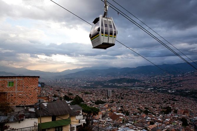 Medellins Comuna 13 Struggle and Splendor - Urban Development and Its Impacts