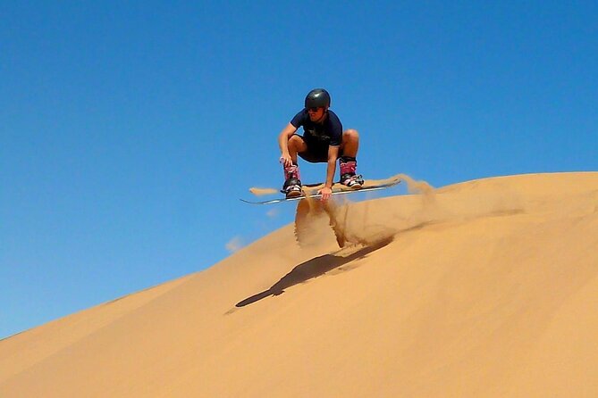 Premium Morning Dessert Safari With Quad Bike , Sand Boarding & Dune Bashing - Camel Riding Experience