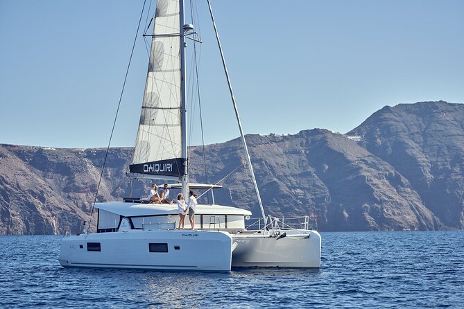 Santorini Oia: Private Sunset Catamaran Cruise With BBQ & Drinks - Meeting and Pickup