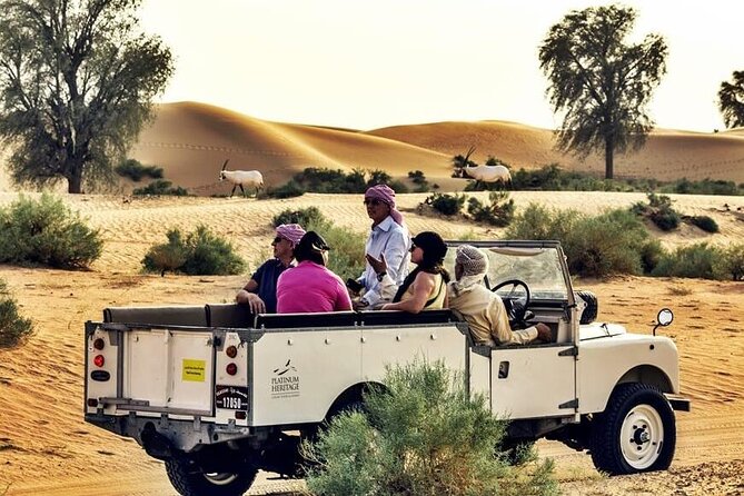 Thrilling Desert Safari Dubai Adventure With Sand Boarding and Barbecue Dinner - Cultural Immersion at the Desert Camp