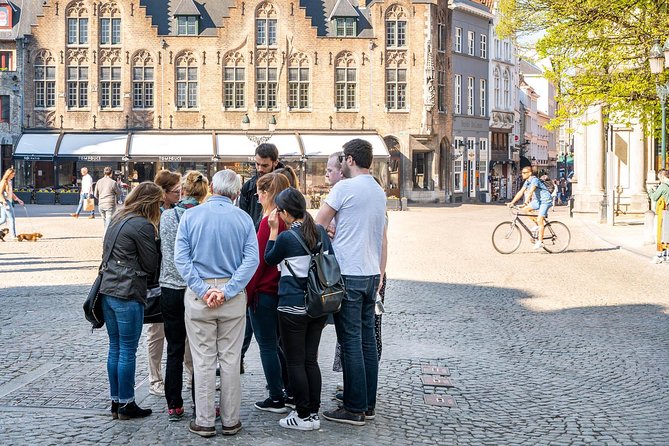Unveil Bruges Hidden Gems: Guided Walking Tour With Local Treats - Exploring Lesser-Known Areas