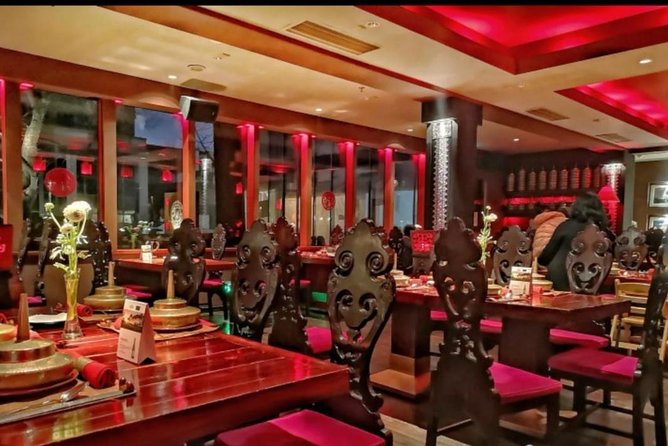 Beijing Traditional Hot Pot Dinner and VIP Seated Acrobatic Show - Exploring the Houhai Lake Area