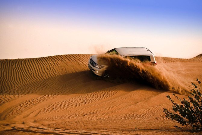 Dubai Dune Bashing Safari With BBQ Dinner, Entertainment and Camel Ride - Dune Bashing Adventure