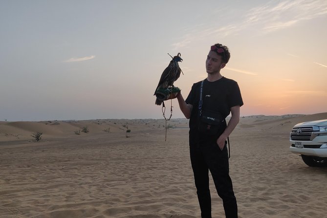 Dubai Red Dunes Quad Bike Tour,Sandboard, Camel Ride & BBQ Dinner - Ratings and Cancellation Policy