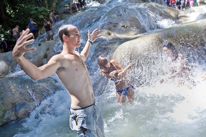 Dunns River Falls & Luminous Lagoon Guided Tour With Admission From Falmouth - Cancellation and Review Information
