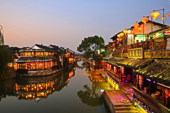 Private Fengjing and Xitang Water Town Sunset Boating Tour With Dinner From Shanghai - Scenic Boat Ride Experience