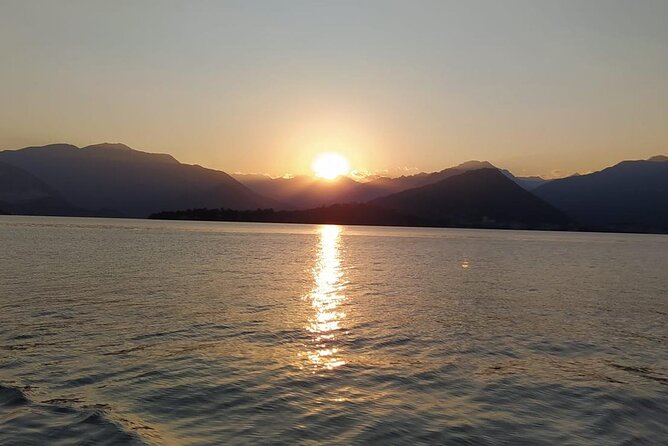 Private Tour on a Sailing Boat on Lake Maggiore With Aperitif and Music - Included Amenities and Activities
