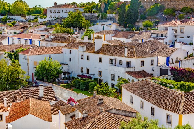 Transfer From Lisbon to Porto W/ Óbidos, Fátima and Nazaré - Accessibility and Participation